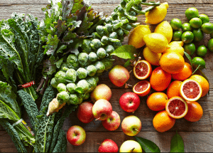 a group of fruits and vegetables on a wood surface Healthy Weight Loss Diets Milngavie